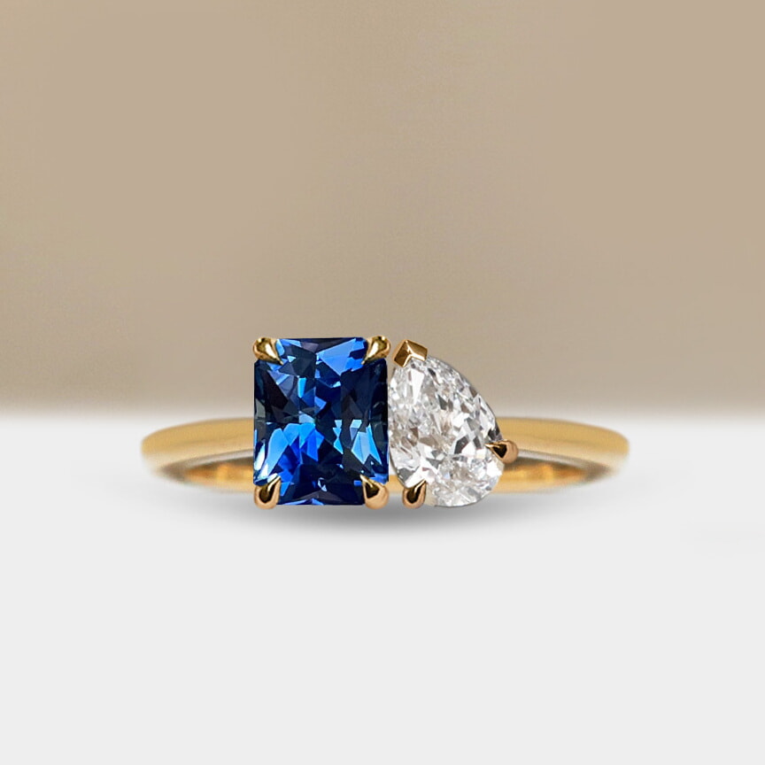 Radiant-cut blue sapphire engagement ring